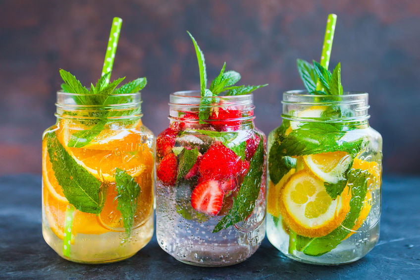 Fresh lemonade jar with mint, summer fruits and berries